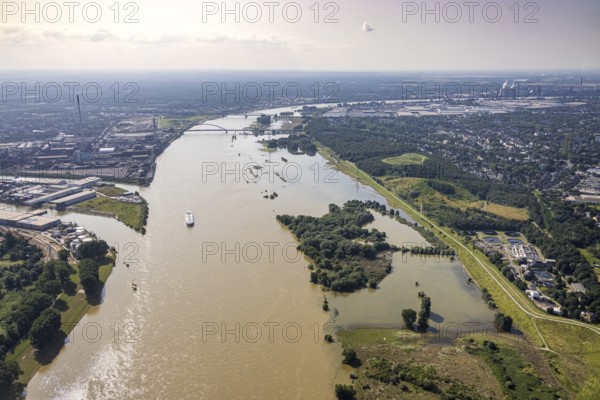 Aerial view, flood river Rhine, entrance to the outer harbour, flooding Rheinwiesen Rheinhausen and NSG Werthauser Wardt, sewage treatment plant Duisburg Rheinhausen, Bergheim, Duisburg, Ruhr area, North Rhine-Westphalia, Germany, DE, Europe, harbour, flood, flood of the century, aerial view, aerial photography, aerial photography, nature reserve, water level Duisburg, Rhine flood, heavy rain, overview, bird's eye view, overview, flooding