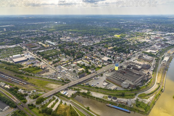Aerial view, housing estate and commercial area Wanheimer Straße, Eschenstraße, district Wanheimerort, Duisburg, Ruhr area, North Rhine-Westphalia, Germany, DE, Europe, property tax, real estate, aerial view, aerial photography, aerial photography, tower, overview, bird's-eye view, housing estate, living and living, residential area, residential buildings, quality of living, housing estate, alga Reifen GmbH, birds-eyes view, overview