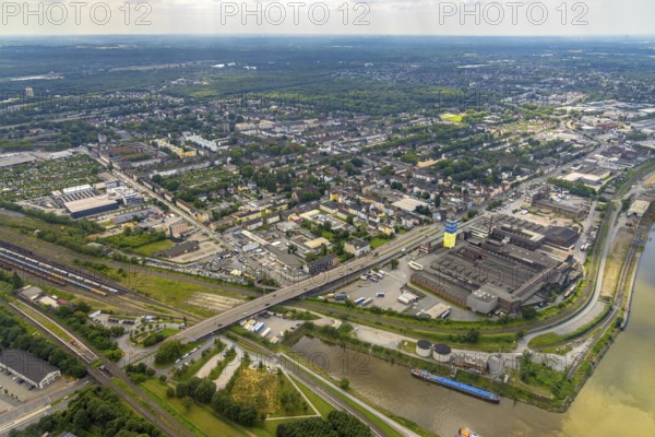 Aerial view, housing estate and commercial area Wanheimer Straße, Eschenstraße, district Wanheimerort, Duisburg, Ruhr area, North Rhine-Westphalia, Germany, DE, Europe, property tax, real estate, aerial view, aerial photography, aerial photography, tower, overview, bird's-eye view, housing estate, living and living, residential area, residential buildings, quality of living, housing estate, alga Reifen GmbH, birds-eyes view, overview