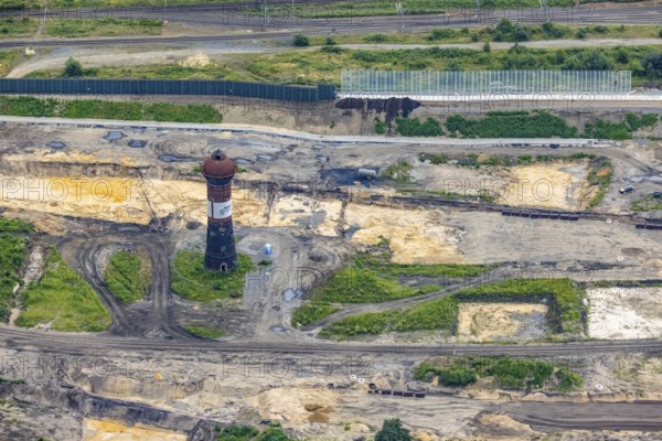 Aerial view, former marshalling yard Wedau with water tower, planned new Duisburg residential quarter, Wedau, Duisburg, Ruhr area, North Rhine-Westphalia, Germany, railway tracks, construction work, construction vehicles, construction area, construction site, construction project, construction project, construction site, DE, development, Europe, industrial facilities, industrial area, industrial site, capacity requirements, aerial view, aerial photography, aerial photography, redevelopment, overview, bird's eye view, water tower in marshalling yard, birds-eyes view, derelict railway area, overview