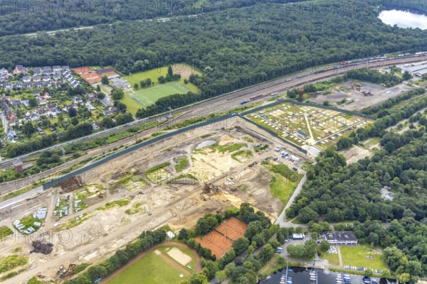 Aerial view, former marshalling yard Wedau, planned new Duisburg residential quarter, Wedau, Duisburg, Ruhr area, North Rhine-Westphalia, Germany, railway tracks, construction work, construction vehicles, construction area, construction site, construction project, construction site, DE, development, Europe, industrial plants, industrial area, industrial site, capacity requirements, aerial view, aerial photography, aerial photography, aerial photography, redevelopment, overview, bird's-eye view, birds-eyes view, derelict railway area, overview