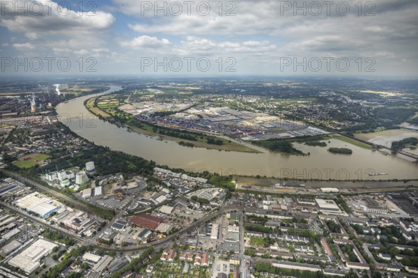 Aerial view, flood river Rhine, logport I, logistics terminal, container port, automobile logistics, Wanheimerort, Duisburg, Ruhr area, North Rhine-Westphalia, Germany, D3T Duisburg Trimodal Terminal, DE, Europe, flood, flood of the century, logistics, logistics service, logistics service provider, logistics provider, logistics centre, aerial view, aerial photography, aerial photography, Duisburg water level, Rhine flood, heavy rain, terminal, transport service, overview, bird's-eye view, bird's-eye view, logport 1, overview, flooding