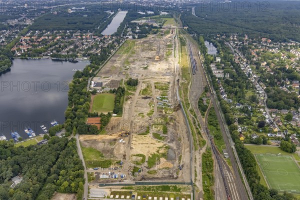 Aerial view, former marshalling yard Wedau, planned new Duisburg residential quarter, Wedau, Duisburg, Ruhr area, North Rhine-Westphalia, Germany, railway tracks, construction work, construction vehicles, construction area, construction site, construction project, construction site, DE, development, Europe, industrial plants, industrial area, industrial site, capacity requirements, aerial view, aerial photography, aerial photography, aerial photography, redevelopment, overview, bird's-eye view, birds-eyes view, derelict railway area, overview