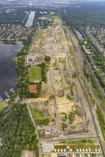 Aerial view, former marshalling yard Wedau, planned new Duisburg residential quarter, Wedau, Duisburg, Ruhr area, North Rhine-Westphalia, Germany, railway tracks, construction work, construction vehicles, construction area, construction site, construction project, construction site, DE, development, Europe, industrial plants, industrial area, industrial site, capacity requirements, aerial view, aerial photography, aerial photography, aerial photography, redevelopment, overview, bird's-eye view, birds-eyes view, derelict railway area, overview