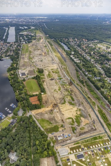 Aerial view, former marshalling yard Wedau, planned new Duisburg residential quarter, Wedau, Duisburg, Ruhr area, North Rhine-Westphalia, Germany, railway tracks, construction work, construction vehicles, construction area, construction site, construction project, construction site, DE, development, Europe, industrial plants, industrial area, industrial site, capacity requirements, aerial view, aerial photography, aerial photography, aerial photography, redevelopment, overview, bird's-eye view, birds-eyes view, derelict railway area, overview