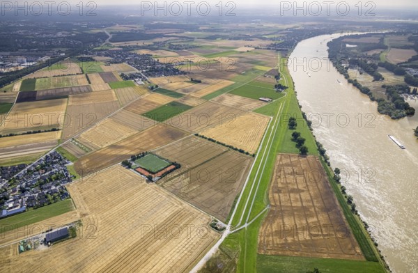 Aerial view, flood river Rhine, meadows and fields in Mündelheim, Duisburg, Ruhr area, North Rhine-Westphalia, Germany, DE, Europe, flood, flood of the century, aerial view, aerial photography, aerial photography, water level Duisburg, Rhine flood, heavy rain, overview, bird's eye view, meadows and fields, birds-eyes view, overview, flooding