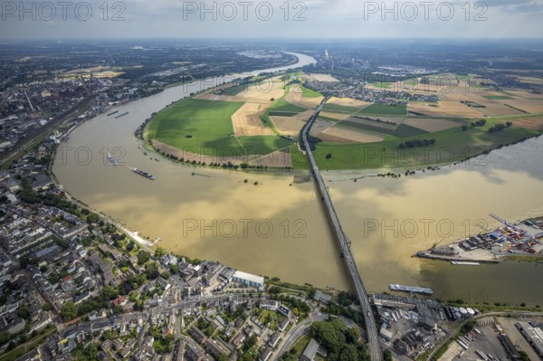 Aerial view, Krefeld-Uerdingen bridge, flood river Rhine, flooding Rhine floodplain Mündelheim, Rhine bend, Rhine floodplain Ehingen, Duisburg, Mündelheim, Ürdingen, Krefeld, Ruhr area, North Rhine-Westphalia, Germany, bridge, DE, Europe, flood, flood of the century, aerial view, aerial photography, aerial photography, water level Duisburg, Rhine flood, heavy rain, overview, bird's eye view, overview, flooding