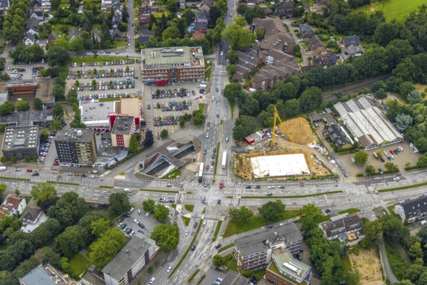 Aerial view, construction site and new building at the intersection of Sittardsberger Allee and Altenbrucher Damm, Sparkasse construction site, Buchholz, Duisburg, Ruhr area, North Rhine-Westphalia, Germany, construction work, construction area, construction site, building plots, construction project, construction site, DE, Europe, aerial view, aerial photography, aerial photography, new building, Sittardsberg, overview, bird's-eye view, bird's-eye view, overview
