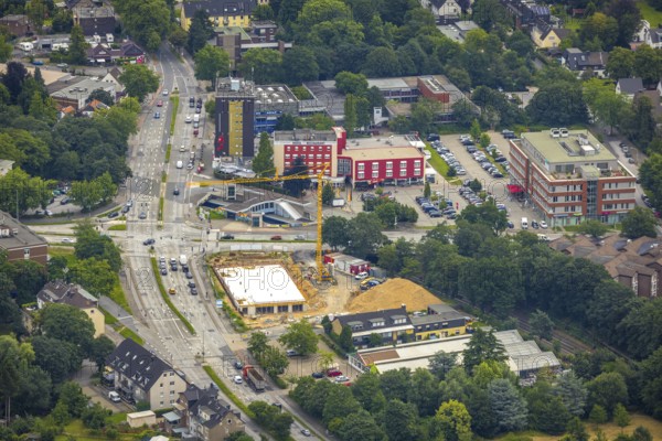 Aerial view, construction site and new building at the intersection of Sittardsberger Allee and Altenbrucher Damm, Sparkasse construction site, Buchholz, Duisburg, Ruhr area, North Rhine-Westphalia, Germany, construction work, construction area, construction site, building plots, construction project, construction site, DE, Europe, aerial view, aerial photography, aerial photography, new building, Sittardsberg, overview, bird's-eye view, bird's-eye view, overview
