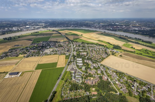 Aerial view, Rhine meadows Mündelheim and Rheinaue Ehingen, river Rhine Rhine arch, Uerdinger Rhine bridge, Mündelheim, Duisburg, Ruhr area, North Rhine-Westphalia, Germany, inland navigation, bridge, DE, Europe, river, river course, suspension bridge, Krefeld-Uerdinger bridge, Krefelder Straße, landscape conservation area, aerial view, aerial photography, aerial photography, Rhine arch, overview, bird's-eye view, birds-eyes view, overview