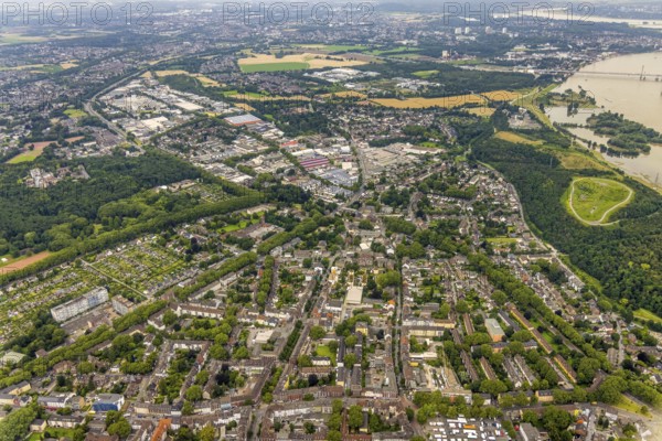 Aerial view, district Rheinhausen and Hochemmerich, commercial area Hochstraße am Volkspark, Duisburg, Ruhr area, North Rhine-Westphalia, Germany, DE, Europe, commercial enterprises, commercial area, commercial park, commercial location, commercial use, Rockelsberg slag heap, flood, industrial area, industrial building, industrial location, aerial view, aerial photography, aerial photography, Rhine flood, overview, bird's-eye view, overview, flooding
