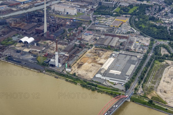 Aerial view, Chemion plant site, Wörthstraße, construction area at the Bridge of Solidarity, Hochfeld, Duisburg, Ruhr area, North Rhine-Westphalia, Germany, demolition work, construction work, construction area, construction site, building plots, construction project, construction site, bridge, DE, Dickelsbach, development, Europe, river Rhine, commercial enterprises, commercial area, commercial park, commercial site, commercial use, industrial area, industrial building, industrial site, capacity requirement, aerial view, aerial photography, aerial photography, new construction, overview, bird's-eye view, overview