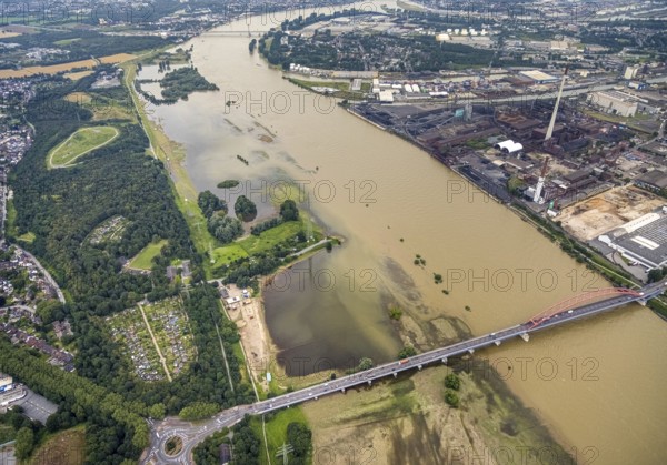 Aerial view, flood river Rhine, flooding of the Rhine meadows Rheinhausen, bridge of solidarity, allotment garden association Rheinuferpark 1950, Hochemmerich, Duisburg, Ruhr area, North Rhine-Westphalia, Germany, bridge, DE, Europe, community garden, flood, flood of the century, KGV, allotment garden, allotment garden site, allotment garden association, aerial view, aerial photography, aerial photography, water level Duisburg, Rhine flood, Rockelsberghalde, allotment garden, heavy rain, overview, riverbank area, bird's-eye view, overview, flooding