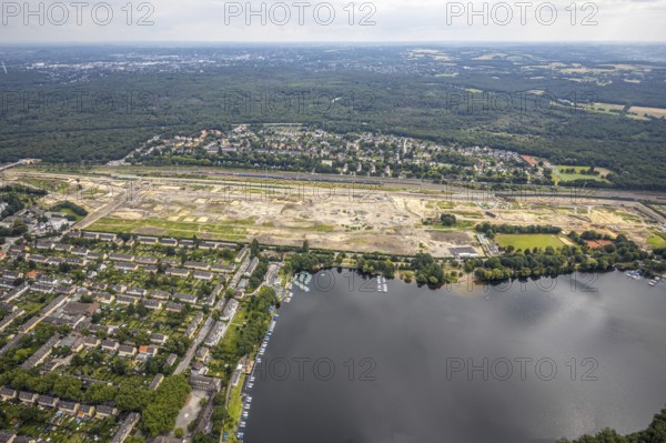 Aerial view, former marshalling yard Wedau, planned new Duisburg residential quarter, Wedau, Duisburg, Ruhr area, North Rhine-Westphalia, Germany, railway tracks, construction work, construction vehicles, construction area, construction site, construction project, construction site, DE, development, Europe, industrial plants, industrial area, industrial site, capacity requirements, aerial view, aerial photography, aerial photography, aerial photography, redevelopment, overview, bird's-eye view, birds-eyes view, derelict railway area, overview