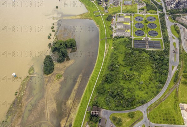 Aerial view, flood river Rhine, flooding river bank area at the sewage treatment plant Duisburg Alte Emscher, Beeckerwerth, Duisburg, Ruhr area, North Rhine-Westphalia, Germany, DE, Europe, flood, flood of the century, aerial photograph, aerial photography, aerial photography, water level Duisburg, Rhine flood, heavy rain, overview, bird's-eye view, overview, flooding