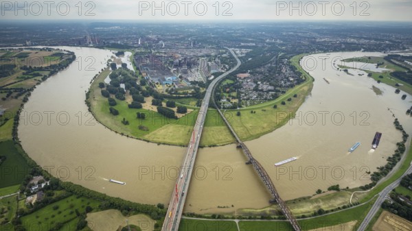 Aerial view, flood river Rhine, motorway A42 Beeckerwerther Brücke and Haus-Knipp-Eisenbahnbrücke with view of Beeckerwerth, Rheinbogen, Bärl, Duisburg, Ruhr area, North Rhine-Westphalia, Germany, motorway, bridge, DE, Europe, flood, flood of the century, aerial view, aerial photography, aerial photography, aerial photography, gauge Duisburg, Rhine flood, heavy rain, overview, bird's-eye view, overview, flooding