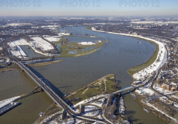 Aerial view, flooding river Rhine at the Friedrich-Ebert-Bridge, Ruhrort, Duisburg, Ruhr area, North Rhine-Westphalia, Germany, DE, Europe, aerial view, aerial photography, aerial photography, snow, overview, Vinckekanal estuary, bird's eye view, winter, birds-eyes view, cleared roads, overview, flood, Rhine flood, winter flood
