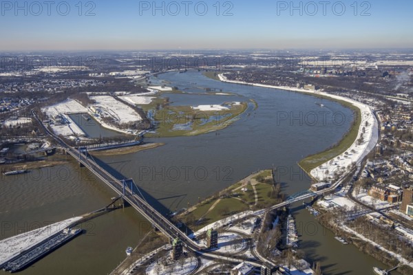 Aerial view, flooding river Rhine at the Friedrich-Ebert-Bridge, Ruhrort, Duisburg, Ruhr area, North Rhine-Westphalia, Germany, DE, Europe, aerial view, aerial photography, aerial photography, snow, overview, Vinckekanal estuary, bird's eye view, winter, birds-eyes view, cleared roads, overview, flood, Rhine flood, winter flood