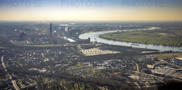 Aerial view, thyssenkrupp Steel Europe backlit, river Rhine, Marxloh, Duisburg, Ruhr area, North Rhine-Westphalia, Germany, DE, Europe, commercial enterprises, commercial area, commercial site, commercial use, industrial area, industrial building, industrial site, aerial photograph, aerial photography, aerial photography, overview, bird's-eye view, overview, industrial scenery, industrial romance, emission, air pollution, dieseliness
