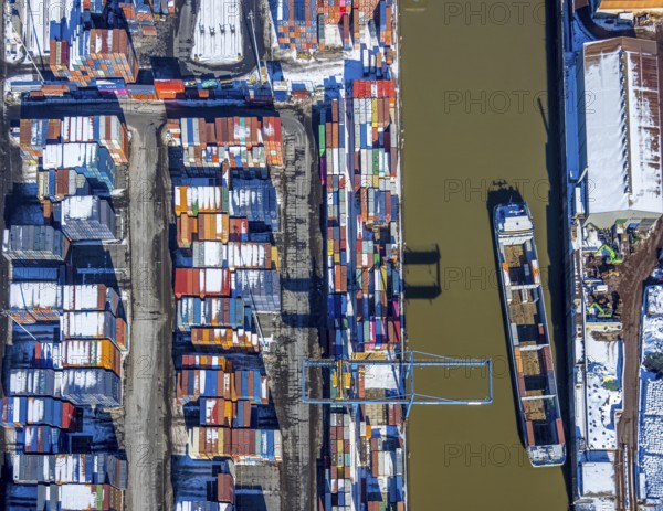 Aerial view, logport I, terminal, container port, DIT Duisburg Intermodal Terminal GmbH, D3T Duisburg Trimodal Terminal, river Rhine, Rheinhausen, Duisburg, Ruhr area, North Rhine-Westphalia, Germany, container, container terminal, container service, DE, Port of Duisburg, Duisport, Europe, freight traffic, port, port area, logistics, logistics centre, aerial view, aerial photography, aerial photography, snow, transport, transport service, overview, bird's-eye view, winter, birds-eyes view, overview