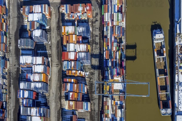 Aerial view, logport I, terminal, container port, DIT Duisburg Intermodal Terminal GmbH, D3T Duisburg Trimodal Terminal, river Rhine, Rheinhausen, Duisburg, Ruhr area, North Rhine-Westphalia, Germany, container, container terminal, container service, DE, Port of Duisburg, Duisport, Europe, freight traffic, port, port area, logistics, logistics centre, aerial view, aerial photography, aerial photography, snow, transport, transport service, overview, bird's-eye view, winter, birds-eyes view, overview