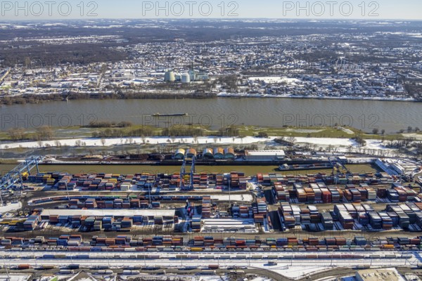 Aerial view, logport I, terminal, container port, DIT Duisburg Intermodal Terminal GmbH, D3T Duisburg Trimodal Terminal, river Rhine, Rheinhausen, Duisburg, Ruhr area, North Rhine-Westphalia, Germany, container, container terminal, container service, DE, Port of Duisburg, Duisport, Europe, freight traffic, port, port area, logistics, logistics centre, aerial view, aerial photography, aerial photography, snow, transport, transport service, overview, bird's-eye view, winter, birds-eyes view, overview