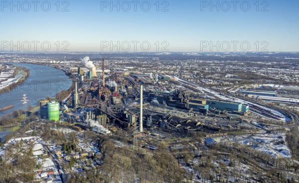 Aerial view, Hüttenwerke Krupp Mannesmann and Huckingen power station, Rheinaue Ehingen, Mündelheim, Duisburg, Ruhr area, North Rhine-Westphalia, Germany, DE, energy supplier, energy supplier, Europe, gas-fired power station, aerial view, aerial photography, aerial photography, snow, electricity supply company, overview, bird's eye view, winter, birds-eyes view, cleared roads, overview