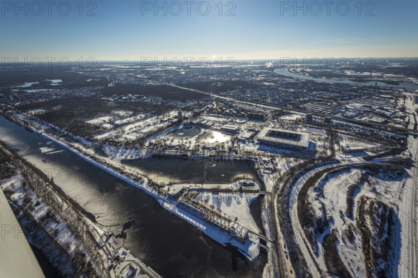 Aerial view, football stadium Schauinsland-Reisen-Arena, MSV Duisburg Arena, Sportpark Duisburg, Duisburg, Ruhr area, North Rhine-Westphalia, Germany, Arena, DE, Europe, leisure area, football pitch, football stadium, football club, aerial view, aerial photography, aerial photography, snow, sports, sports facilities, sports area, Sportpark Wedau, sports field, sports facility, stadium, overview, bird's eye view, winter, birds-eyes view, cleared roads, overview