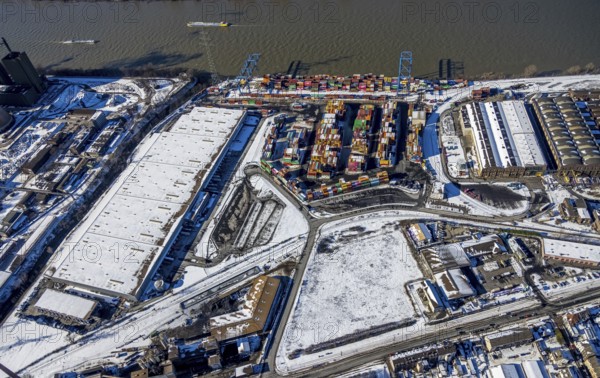 Aerial view, Logport II, warehouse and goods handling, river Rhine, Wanheim-Angerhausen, Duisburg, Ruhr area, North Rhine-Westphalia, Germany, DE, Europe, aerial view, aerial photography, aerial photography, snow, overview, bird's eye view, winter, birds-eyes view, cleared roads, overview