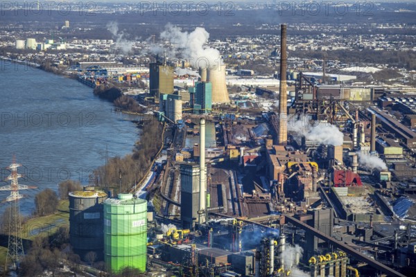 Aerial view, Hüttenwerke Krupp Mannesmann and Huckingen power station, Rheinaue Ehingen, Mündelheim, Duisburg, Ruhr area, North Rhine-Westphalia, Germany, DE, energy supplier, energy supplier, Europe, gas-fired power station, aerial view, aerial photography, aerial photography, snow, electricity supply company, overview, bird's eye view, winter, birds-eyes view, cleared roads, overview