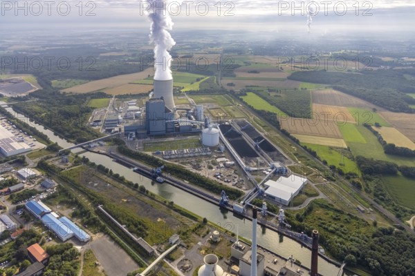 Aerial view of the power plant facilities and exhaust gas towers of the coal-fired power plant Datteln 4 Uniper power plant Im Löringhof at the Dortmund-Ems canal in Datteln in the Ruhr area in the federal state of North Rhine-Westphalia, Germany, Datteln, Ruhr area, North Rhine-Westphalia, DE, Europe, aerial view, birds-eyes view, aerial photography, aerial photography, overview, bird's eye view