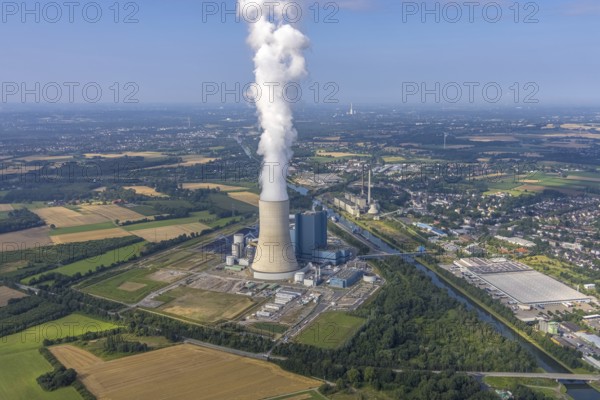Aerial view of the power plant facilities and exhaust gas towers of the coal-fired power plant Datteln 4 Uniper power plant Im Löringhof at the Dortmund-Ems canal in Datteln in the Ruhr area in the federal state of North Rhine-Westphalia, Germany, Datteln, Ruhr area, North Rhine-Westphalia, DE, Europe, aerial view, birds-eyes view, aerial photography, aerial photography, overview, bird's eye view