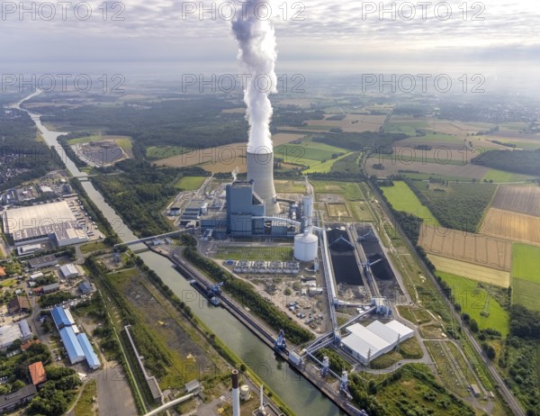 Aerial view of the power plant facilities and exhaust gas towers of the coal-fired power plant Datteln 4 Uniper power plant Im Löringhof at the Dortmund-Ems canal in Datteln in the Ruhr area in the federal state of North Rhine-Westphalia, Germany, Datteln, Ruhr area, North Rhine-Westphalia, DE, Europe, aerial view, birds-eyes view, aerial photography, aerial photography, overview, bird's eye view