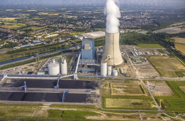 Aerial view of the power plant facilities and exhaust gas towers of the coal-fired power plant Datteln 4 Uniper power plant Im Löringhof at the Dortmund-Ems canal in Datteln in the Ruhr area in the federal state of North Rhine-Westphalia, Germany, Datteln, Ruhr area, North Rhine-Westphalia, DE, Europe, aerial view, birds-eyes view, aerial photography, aerial photography, overview, bird's eye view