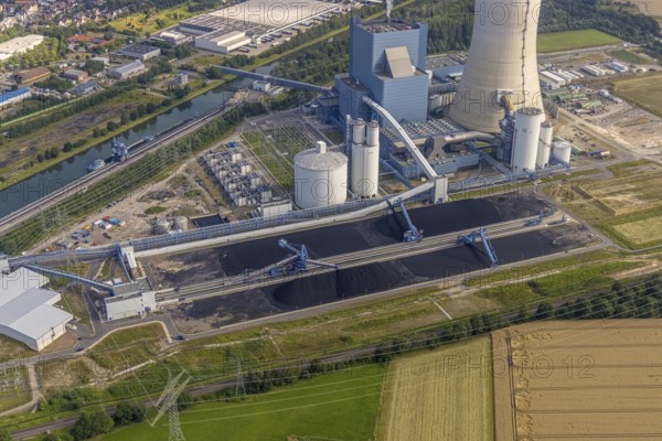Aerial view of the power plant facilities and exhaust gas towers of the coal-fired power plant Datteln 4 Uniper power plant Im Löringhof at the Dortmund-Ems canal in Datteln in the Ruhr area in the federal state of North Rhine-Westphalia, Germany, Datteln, Ruhr area, North Rhine-Westphalia, DE, Europe, aerial view, birds-eyes view, aerial photography, aerial photography, overview, bird's eye view