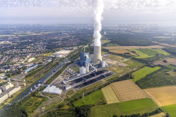 Aerial view of the power plant facilities and exhaust gas towers of the coal-fired power plant Datteln 4 Uniper power plant Im Löringhof at the Dortmund-Ems canal in Datteln in the Ruhr area in the federal state of North Rhine-Westphalia, Germany, Datteln, Ruhr area, North Rhine-Westphalia, DE, Europe, aerial view, birds-eyes view, aerial photography, aerial photography, overview, bird's eye view