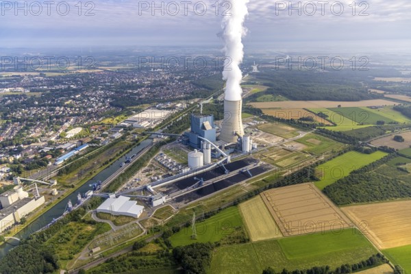 Aerial view of the power plant facilities and exhaust gas towers of the coal-fired power plant Datteln 4 Uniper power plant Im Löringhof at the Dortmund-Ems canal in Datteln in the Ruhr area in the federal state of North Rhine-Westphalia, Germany, Datteln, Ruhr area, North Rhine-Westphalia, DE, Europe, aerial view, birds-eyes view, aerial photography, aerial photography, overview, bird's eye view