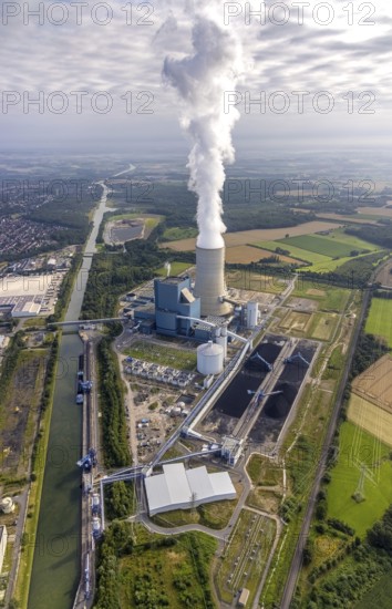 Aerial view of the power plant facilities and exhaust gas towers of the coal-fired power plant Datteln 4 Uniper power plant Im Löringhof at the Dortmund-Ems canal in Datteln in the Ruhr area in the federal state of North Rhine-Westphalia, Germany, Datteln, Ruhr area, North Rhine-Westphalia, DE, Europe, aerial view, birds-eyes view, aerial photography, aerial photography, overview, bird's eye view