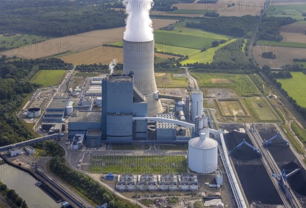 Aerial view of the power plant facilities and exhaust gas towers of the coal-fired power plant Datteln 4 Uniper power plant Im Löringhof at the Dortmund-Ems canal in Datteln in the Ruhr area in the federal state of North Rhine-Westphalia, Germany, Datteln, Ruhr area, North Rhine-Westphalia, DE, Europe, aerial view, birds-eyes view, aerial photography, aerial photography, overview, bird's eye view