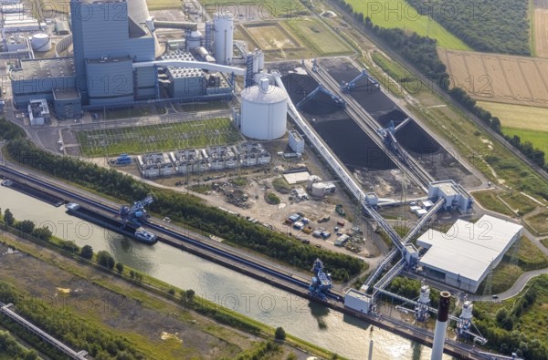 Aerial view of the power plant facilities and exhaust gas towers of the coal-fired power plant Datteln 4 Uniper power plant Im Löringhof at the Dortmund-Ems canal in Datteln in the Ruhr area in the federal state of North Rhine-Westphalia, Germany, Datteln, Ruhr area, North Rhine-Westphalia, DE, Europe, aerial view, birds-eyes view, aerial photography, aerial photography, overview, bird's eye view