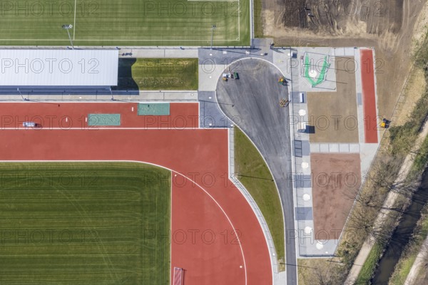 Aerial view, construction site new football pitches and sports facility of Spiel- und Sportverein 09 e.V. Dinslaken, Hagenviertel, Dinslaken, Ruhr area, North Rhine-Westphalia, Germany, construction work, construction site, construction project, building site, DE, Europe, shapes and colours, football pitch, football stadium, football club, property tax, real estate, athletics stadium, aerial view, aerial photography, aerial photography, apartment buildings, Lower Rhine, Rhine, sports, sports facilities, sports field, sports facility, stadium, overview, bird's-eye view, residential complex, housing and living, residential buildings, residential neighbourhood, housing estate, birds-eyes view, overview