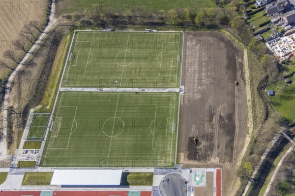 Aerial view, construction site new football pitches and sports facility of Spiel- und Sportverein 09 e.V. Dinslaken, Hagenviertel, Dinslaken, Ruhr area, North Rhine-Westphalia, Germany, construction work, construction site, construction project, building site, DE, Europe, football pitch, football stadium, football club, property tax, real estate, athletics stadium, aerial view, aerial photography, aerial photography, apartment buildings, Lower Rhine, Rhine, sports, sports facilities, sports field, sports facility, stadium, overview, bird's-eye view, residential complex, housing and living, residential buildings, residential neighbourhood, housing estate, birds-eyes view, overview
