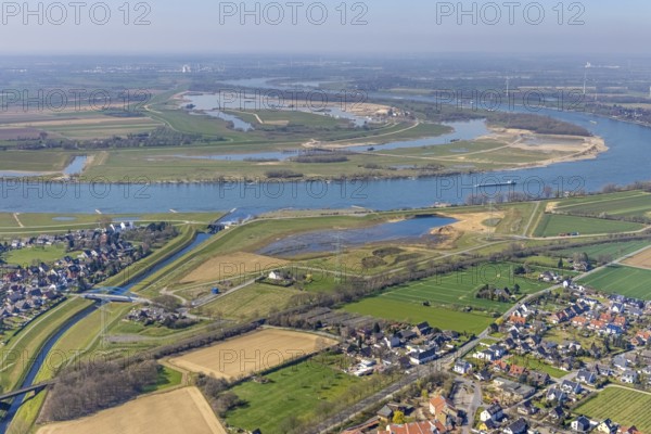 Aerial view, Rhine dyke construction site, Emscher estuary, Emscher estuary drop structure, Emscher bridge Hagelstraße, Rheinaue Walsum, river Emscher, river Rhine, city border to Voerde, Eppinghoven, Dinslaken, Ruhr area, North Rhine-Westphalia, Germany, DE, Emscher, Emscher estuary into the Rhine, Emscher conversion, Europe, Frankfurter Straße, aerial view, aerial photography, aerial photography, estuary, Lower Rhine, Rhine, Rhine floodplain, overview, bird's-eye view, meadows and fields, living and life, birds-eyes view, new Emscher estuary Voerde city boundary, overview