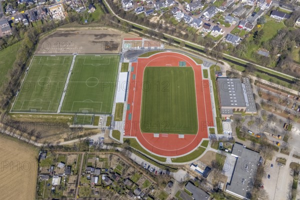Aerial view, construction site new football pitches, sports facility, Spiel- und Sportverein 09 e.V. Dinslaken, gymnasium Hans-Efing-Sporthalle, Dinslaken, North Rhine-Westphalia, Germany, construction work, construction site, construction project, building site, DE, Europe, football pitch, football stadium, football club, athletics stadium, aerial view, aerial photography, aerial photography, tenement houses, Lower Rhine, Rhine, Ruhr area, sport, sports facilities, sports field, sports facility, stadium, overview, bird's eye view, birds-eyes view, overview