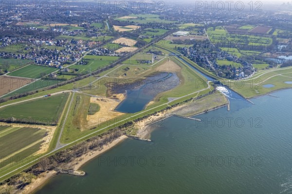 Aerial view, Rhine dyke construction site, new and old Emscher estuary, drop structure Emscher estuary, Emscher bridge Hagelstraße, Rheinaue Walsum, river Emscher, river Rhine, city border to Voerde, Eppinghoven, Dinslaken, Ruhr area, North Rhine-Westphalia, Germany, DE, Emscher, Emscher estuary, Emscher estuary into the Rhine, Emscher conversion, Europe, Frankfurter Straße, aerial view, aerial photography, aerial photography, estuary area, Lower Rhine, Rhine, Rhine floodplain, overview, bird's eye view, meadows and fields, living and life, birds-eyes view, new Emscher estuary Voerde city boundary, overview