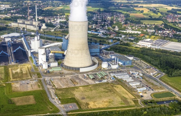Aerial view of the power plant facilities and exhaust gas towers of the coal-fired power plant Datteln 4 Uniper power plant Im Löringhof at the Dortmund-Ems canal in Datteln in the Ruhr area in the federal state of North Rhine-Westphalia, Germany, Datteln, Ruhr area, North Rhine-Westphalia, DE, Europe, aerial view, birds-eyes view, aerial photography, aerial photography, overview, bird's eye view