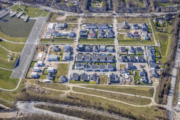 Aerial view, construction site new housing estate at Bergpark Lohberg, living in Kreativ.Quartier Lohberg, Oberlohberg, Dinslaken, Ruhr area, North Rhine-Westphalia, Germany, DE, Europe, property tax, real estate, aerial view, aerial photography, aerial photography, Lower Rhine, Rhine, overview, bird's-eye view, housing estate, living and living, residential area, residential buildings, residential buildings in Kreativ.Quartier Lohberg, quality of living, residential quarter, housing estate, birds-eyes view, overview