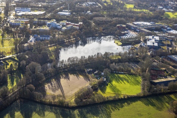 Aerial view of Barkenbergsee with sports field of SuS Grün Weiß Barkenberg and Tennis Park Wulfen in Dorsten in the Ruhr area in North Rhine-Westphalia, Germany, DE, Germany, Dorsten, Europe, football field, football stadium, football club, aerial view, aerial photography, aerial photography, Midlicher Kamp, North Rhine-Westphalia, Ruhr area, lake, sport, sports facilities, sports field, sports facility, stadium, tennis, tennis facility, tennis courts, overview, bird's eye view, birds-eyes view, overview