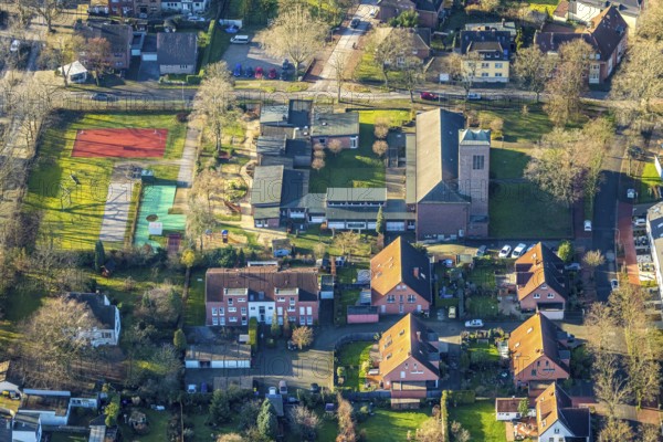Aerial view of St. Josef Church and St. Josef Kindergarten in Dorsten in the Ruhr area in North Rhine-Westphalia, Germany, place of worship, DE, Germany, Dorsten, Europe, religious community, place of worship, holy place, kindergarten, day nursery, day care centre, church, church community, day care centre, denomination, aerial view, aerial photograph, aerial photography, aerial photography, North Rhine-Westphalia, religion, religious site, Ruhr area, overview, bird's-eye view, birds-eyes view, overview