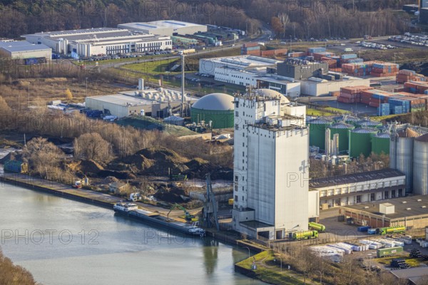 Aerial view Agravis silo tower concentrated feed plant in the industrial area east at the Wesel-Datteln canal in Dorsten in the Ruhr area in North Rhine-Westphalia, Germany, Agravis Raiffeisen AG, DE, Germany, Dorsten, Europe, commercial enterprises, commercial area, commercial park, commercial location, commercial use, industrial area, industrial building, industrial location, aerial view, aerial photograph, aerial photography, aerial photography, North Rhine-Westphalia, Ruhr area, overview, bird's-eye view, Wesel-Datteln Canal, birds-eyes view, compound feed manufacturer, overview